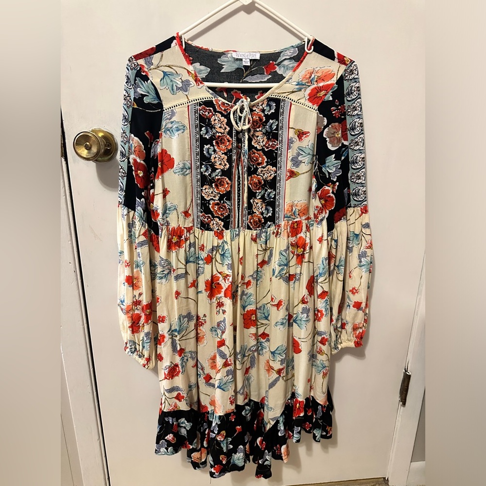 Flowy and flowery dress. Harley ever worn. Great condition